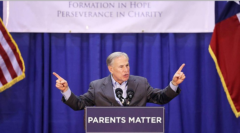 Texas Gov. Greg Abbott speaks to students, parents and staff at Nolan Catholic High School while trying to build support for his school choice plan on April 19, 2023. Photo courtesy of Getty Images.