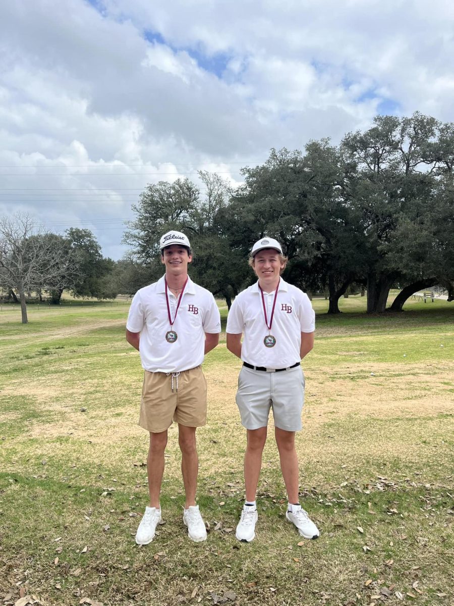 Trace Butschek (6th) and Eli Ferguson (5th) pose with their medals after the Flatonia golf tournament.