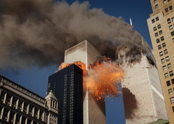 The Twin Towers being hit by the planes on 9/11