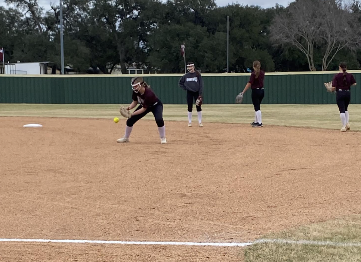 Lady Brahma Softball warming up for their scrimmage